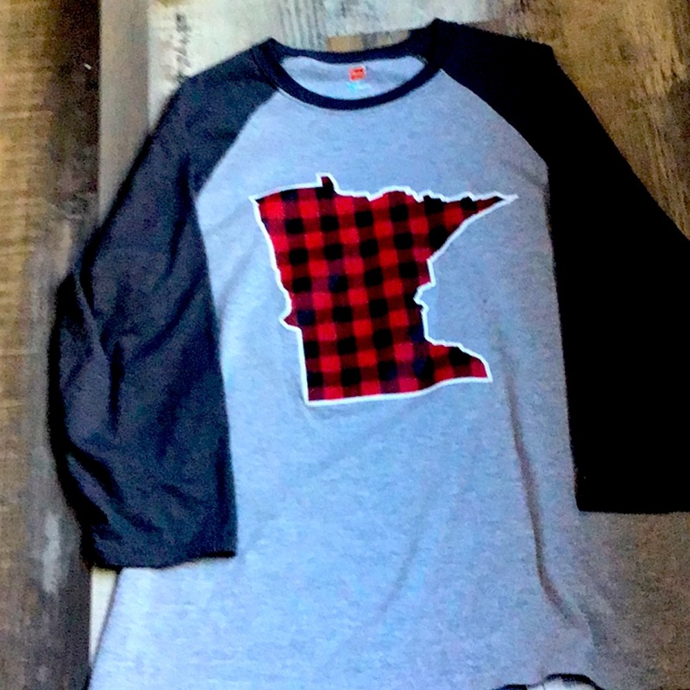 Tee shirt with Minnesota etched in Buffalo plaid.